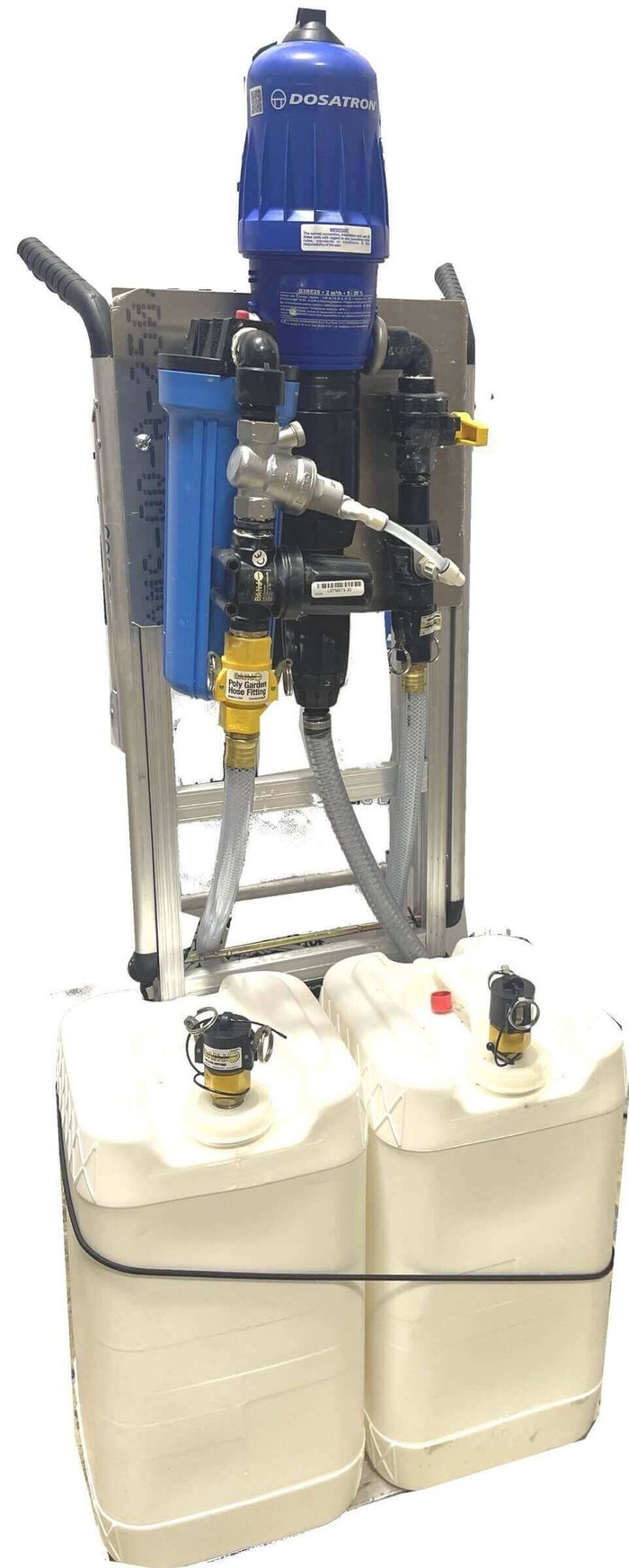 ProTool Clever portable softwash unit spraying a residential exterior